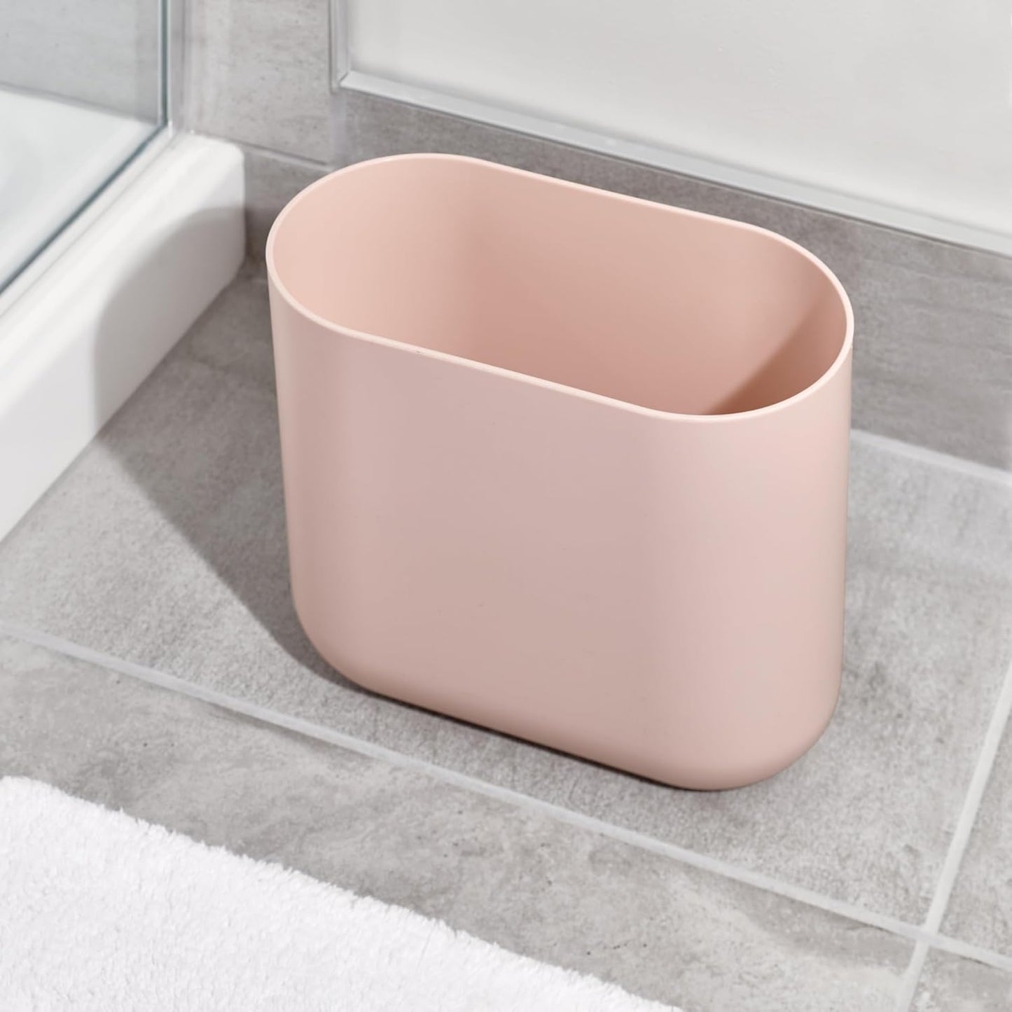 iDesign Cade Oval Slim Trash, Compact Waste Basket Garbage Can for Bathroom, Bedroom, Home Office, Dorm, College, Blush